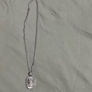 Silver Christ Pendant Necklace. .925silver Cuban link chain with pendant.